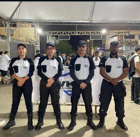 Equipe de Segurança WKM com uniforme oficial em evento